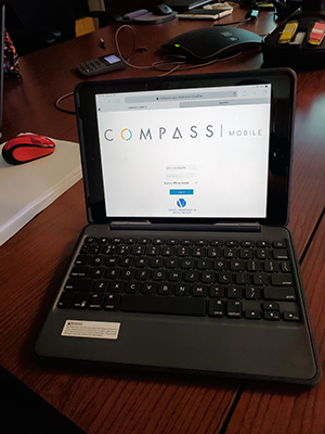 computer screen with COMPASS website