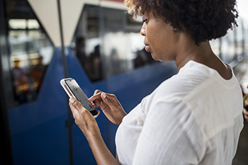 Woman looking at mobile device