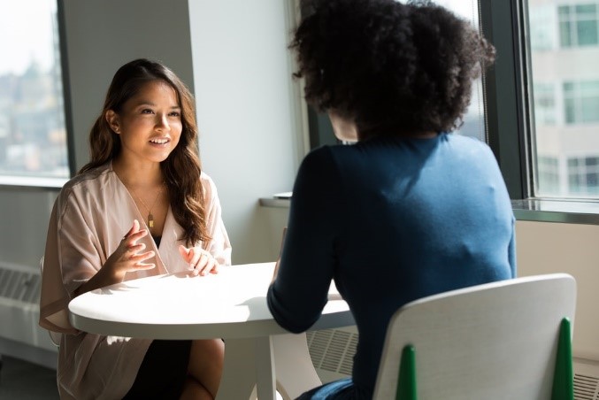 two women talking